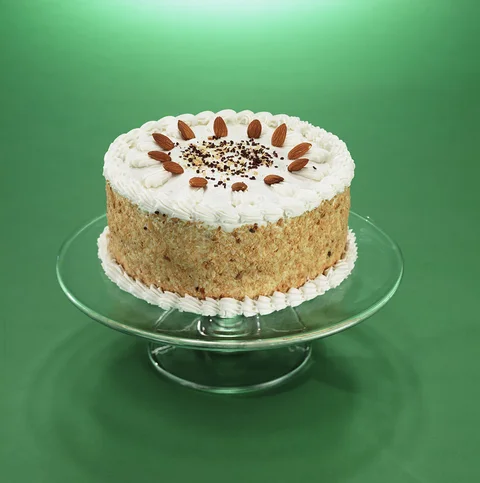 Cake with almonds and cream decoration