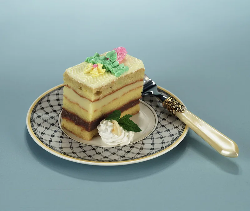Layered pastry with cream on a plate